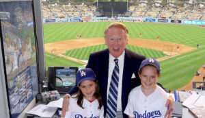 Vin Scully, legendary L.A. Dodgers radio announcer, in 2008 with the daughters of SpartanNash CEO Tony Sarsam