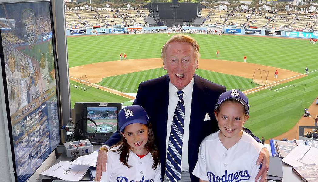 Vin Scully, legendary L.A. Dodgers radio announcer, in 2008 with the daughters of SpartanNash CEO Tony Sarsam